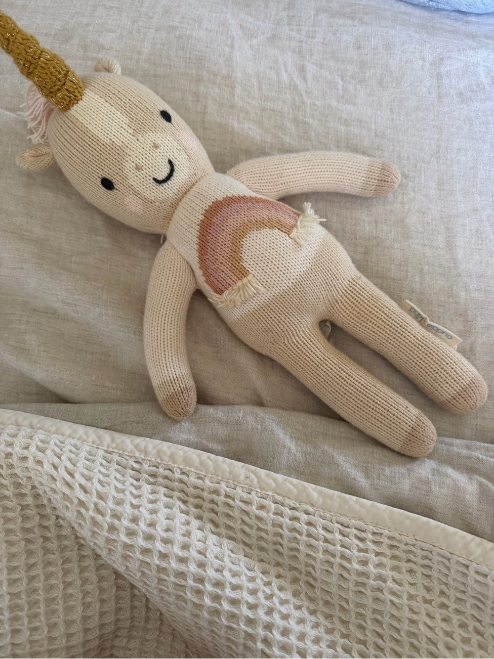 Cuddle + Kind Zara the Unicorn knit toy.
